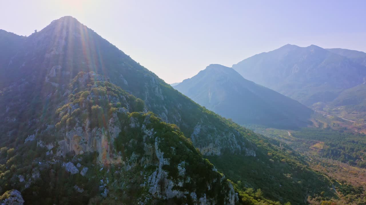 Aerial shot of calm mountain landscape on sunny day