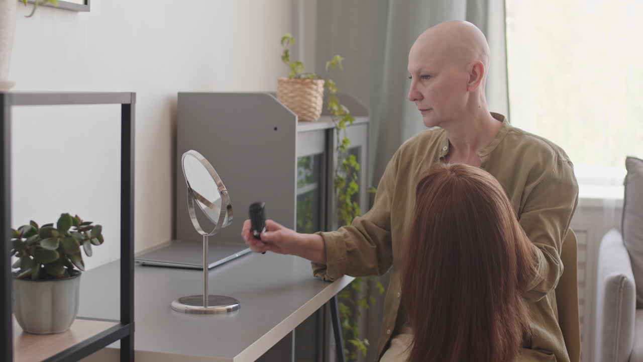 Hairless Woman Wearing Wig at Home