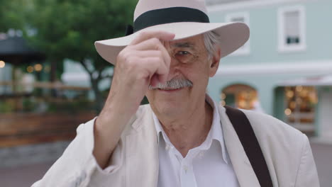 portrait of stylish elderly man smiling cheerful wearing white suit enjoying urban sightseeing travel