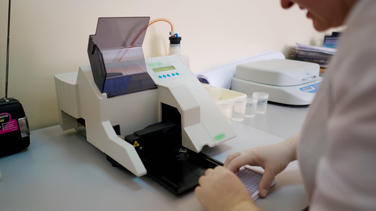 Pharmaceutical Laboratory with equipment. Medical lab worker analyzing blood sample