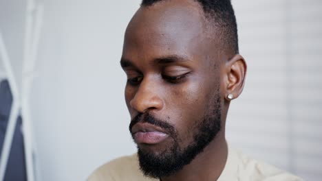 man looking pensively
