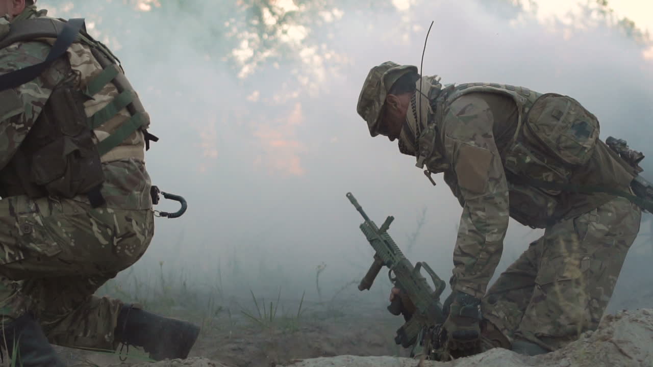 Soldiers in Combat with Smoke and Weapons