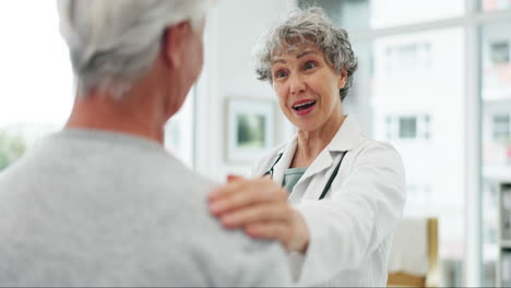 Senior-doctor,-smile-and-woman-comfort-patient