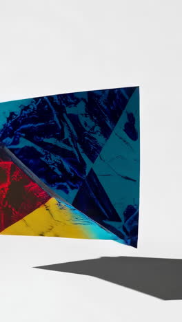abstract geometric shapes with translucent colors and shadows