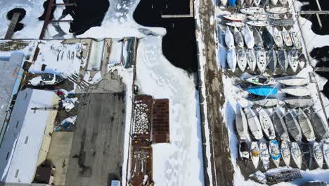 tracking from a birdseye view of the various thawing docks on the south shore of muskegon lake