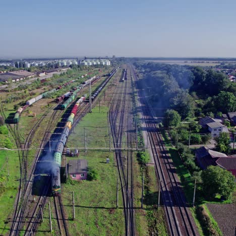 aerial view of a train yard and freight train