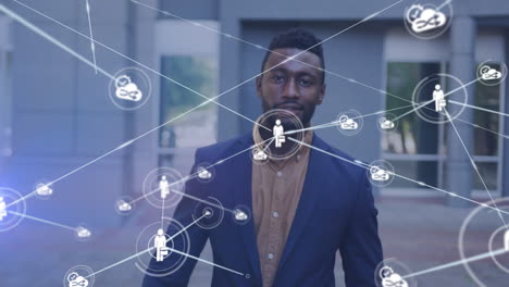 animation of network of connected icons with businessman walking in street smiling