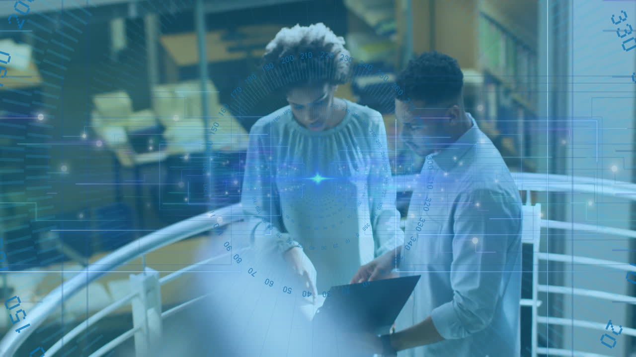 Two professionals collaborating on business tech, showcasing holographic data overlay with grids