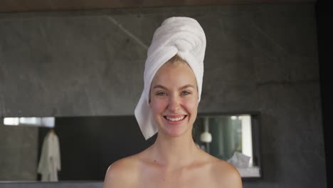 front view of caucasian woman after shower in hotel