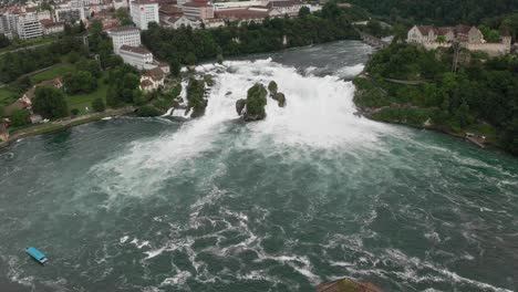 waterfalls of rhine, aerial view showing powerful water flow and surrounding nature