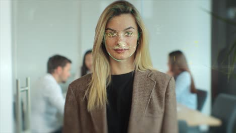 portrait of young woman in office with face recognition technology on. future security user information protection. face detection.