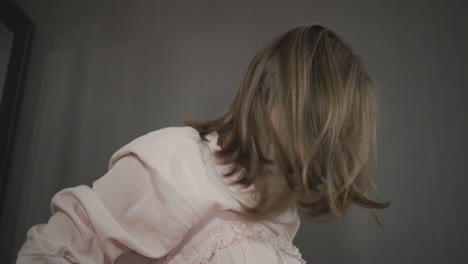 woman in a light pink dress