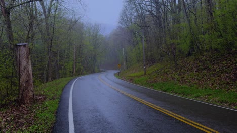 springtime rain, during a stunning atmospheric day, on a beautiful, quiet mountain road in the appalachian mountains