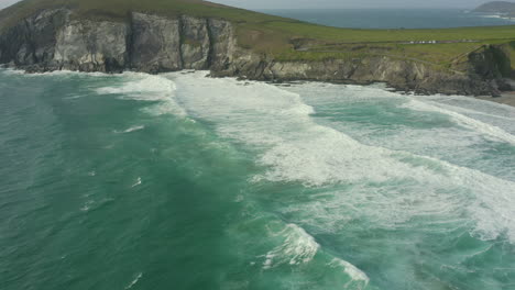 Aerial-view-of-Dunmore-Head,-it-is-a-promontory-in-the-westernmost-part-of-the-Dingle-Peninsula,-located-in-the-barony-of-Corca-Dhuibhne-in-southwest-County-Kerry,-Ireland