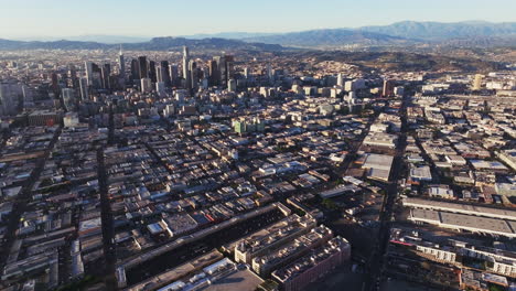 aerial view of a bustling city with a mountain backdrop