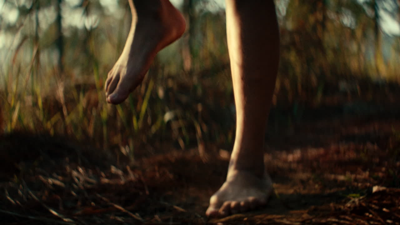 Barefoot Hiking Through the Woods