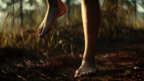 barefoot hiking through the woods
