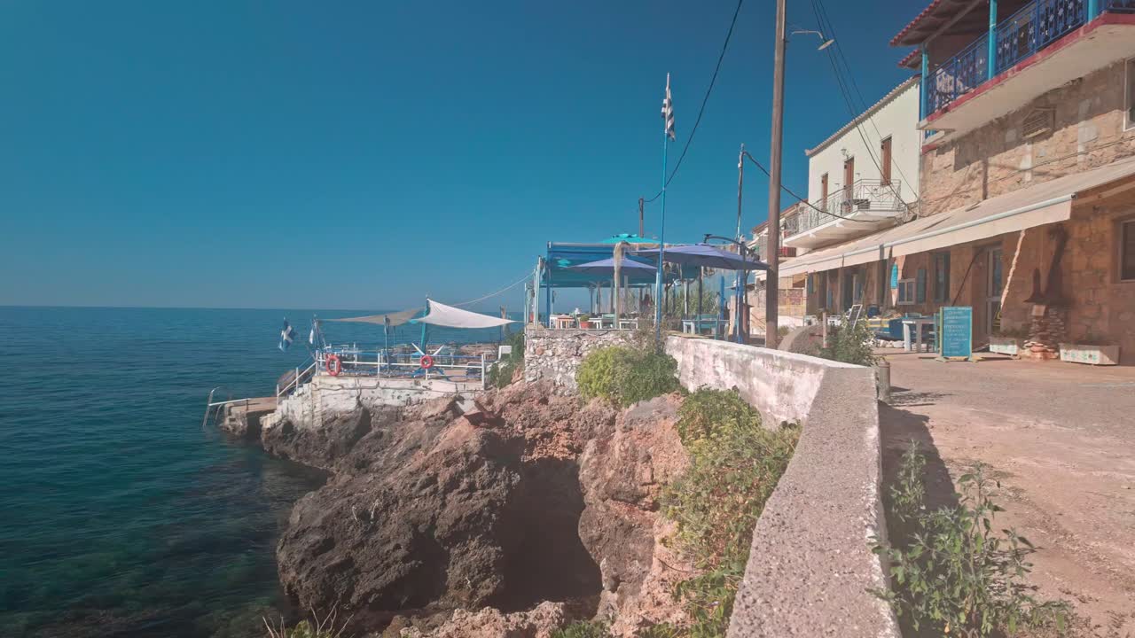 Empty waterfront restaurant Agios Nikolaos, Mani Peloponnese harbour