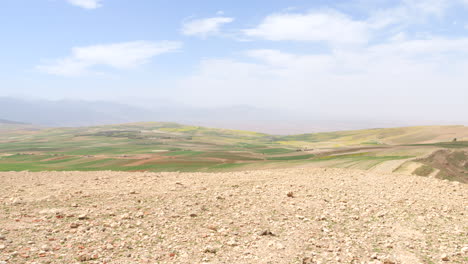 gentle pan of green rolling hills of moroccan pre-atlas landscape
