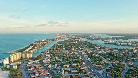 4k aerial drone cityscape of st. petersburg city - florida.
morning shot flying over st pete beach near tampa bay.