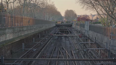 pan up of the train and metro lines in the middle of the city of paris in france