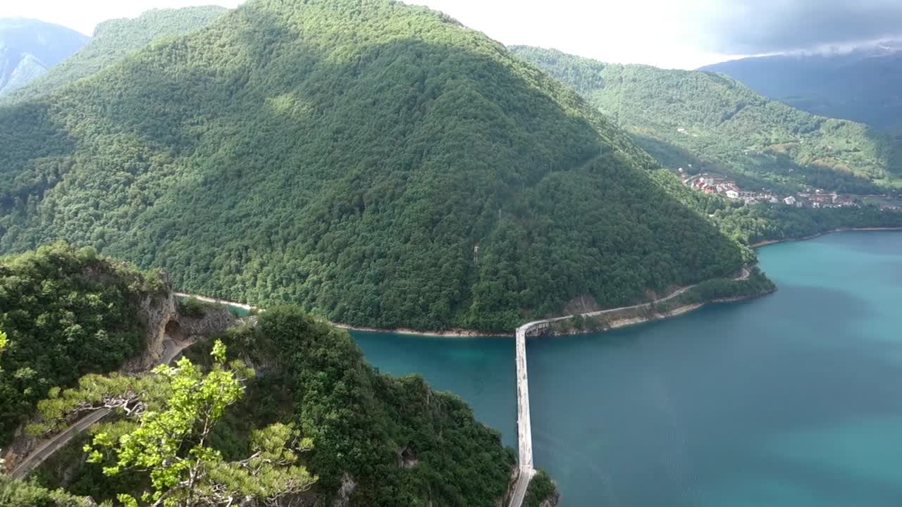 panoramic view of Piva lake near the city of Pluzine and road M18 in Montenegro, Europe