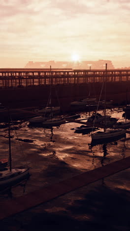 peaceful sunset at a marina with boats docked