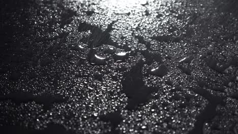 video of wet drops on black background