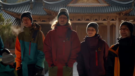 group of people in winter clothing