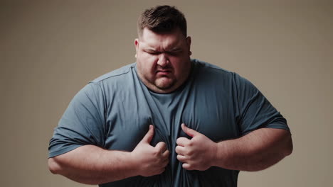 unhealthy man experiencing stomach ache