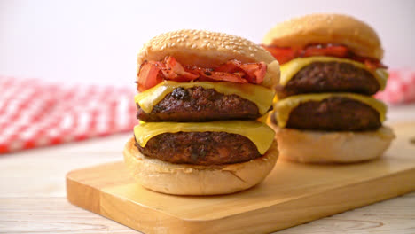 hamburger-or-beef-burgers-with-cheese,-bacon-and-french-fries---unhealthy-food-style