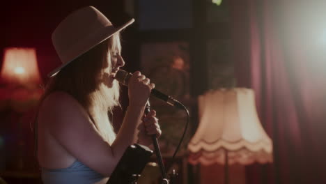 woman singing live in a bar