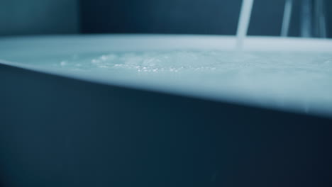 water filling a modern bathtub