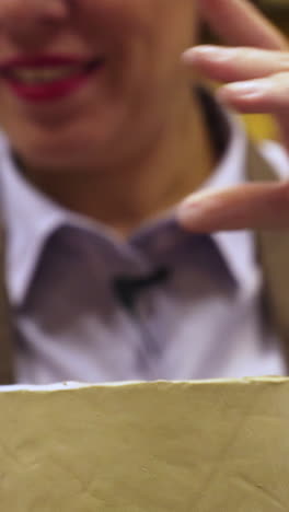 woman working with clay