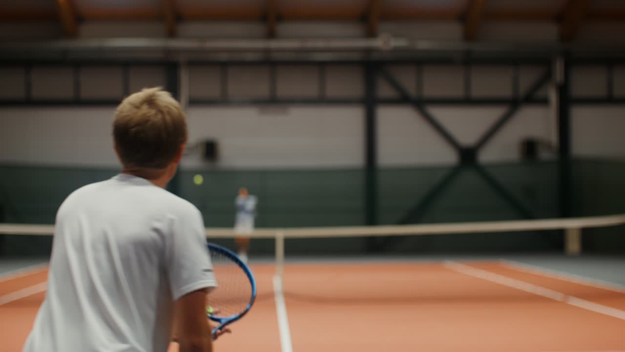 Blurred Indoor Tennis Match