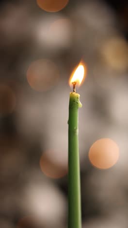 burning green candle