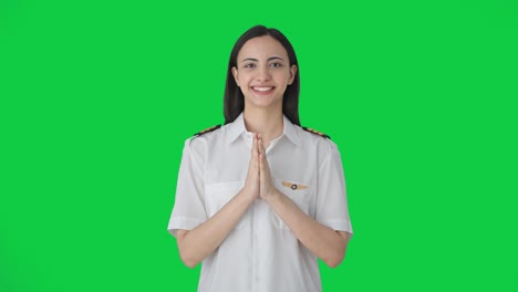 Happy-Indian-pilot-welcoming-passengers-abroad-Green-screen