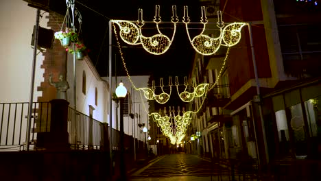 christmas decorations illuminating  a full street in funchal madeira island
