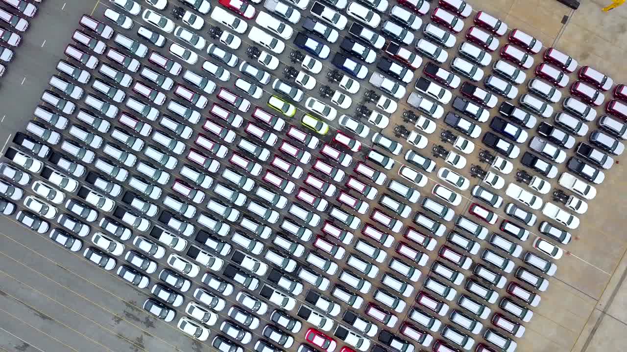 Aerial view new cars in parking lot
