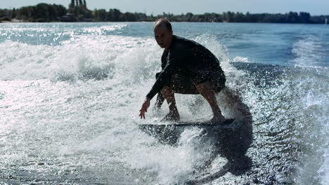 Man-rotating-on-wake-surf