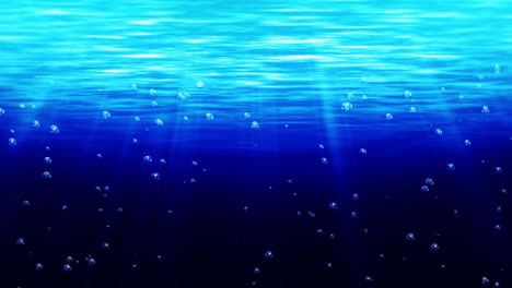 bubbles underwater rising to water surface. blue ocean illuminated the bright rays. water bubbles in the sea. loop animation.