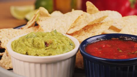 delicious guacamole and salsa with tortilla chips