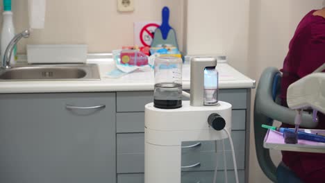 dental deep cleaning device being used in dentist office