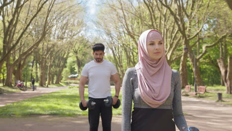 couple working out in a park