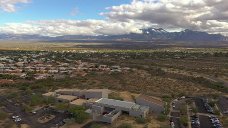 The-Performance-and-Art-Center-in-Green-Valley,-Arizona,-USA,-reverse-drone-orbit