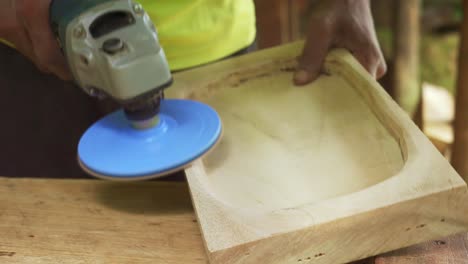 carpenter fine finishing wood work table top with grinder