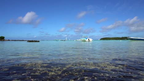 boats moored in lagoon in mauritius