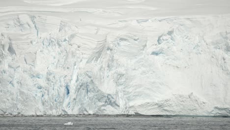 Fragile-glacier-in-the-water-along-shoreline-in-polar-region