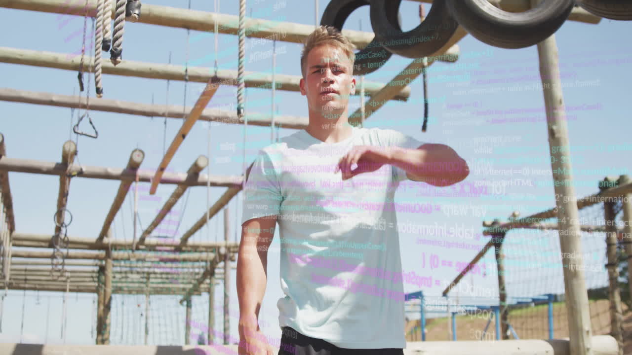 Man exercising on outdoor obstacle course with digital code overlay animation