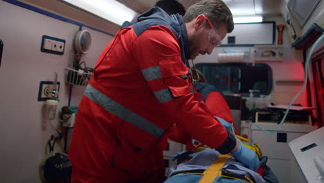 emergency doctors performing first aid to victim